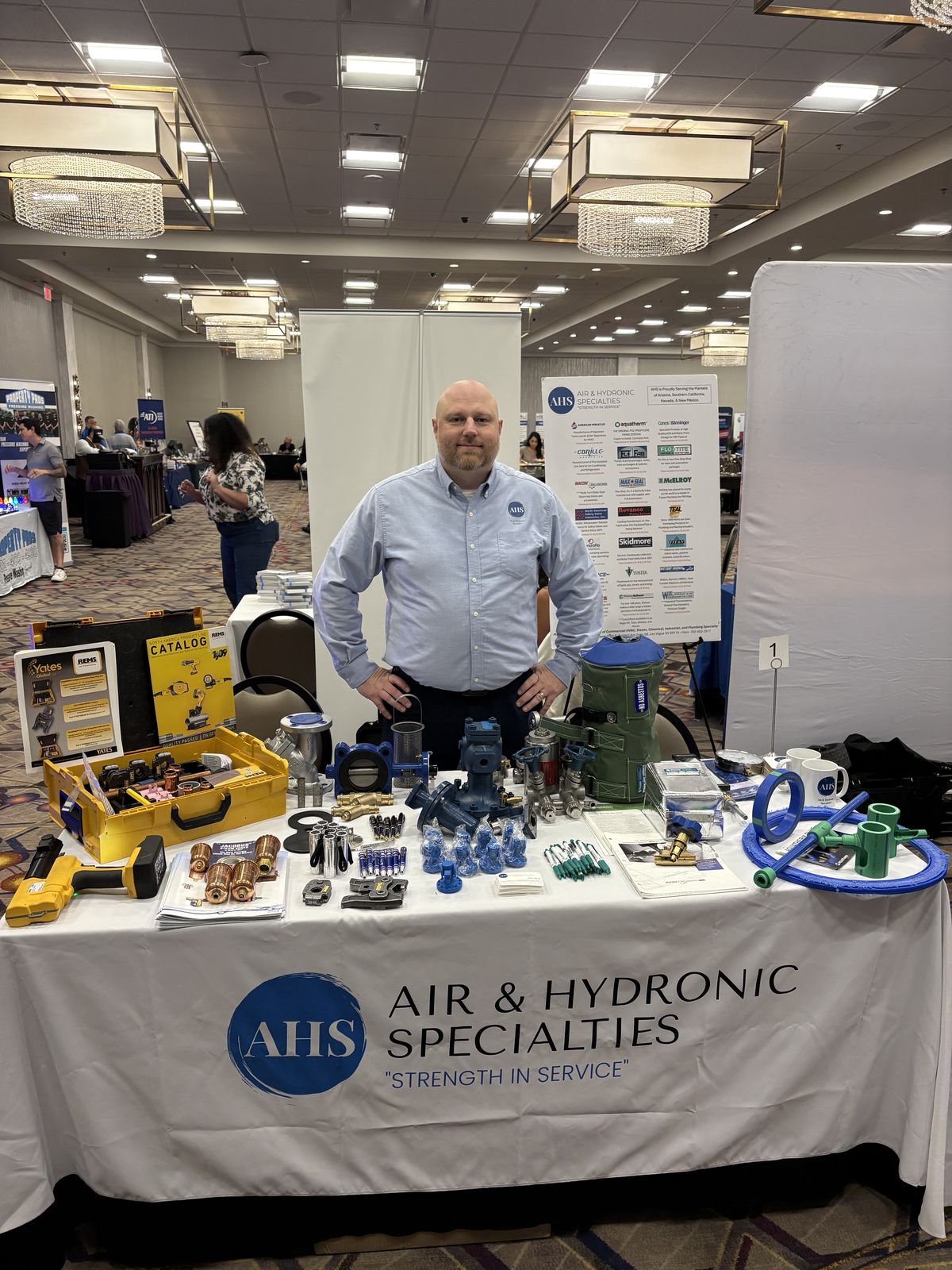 Rob Warnell at the AHS table at an indoor trade show