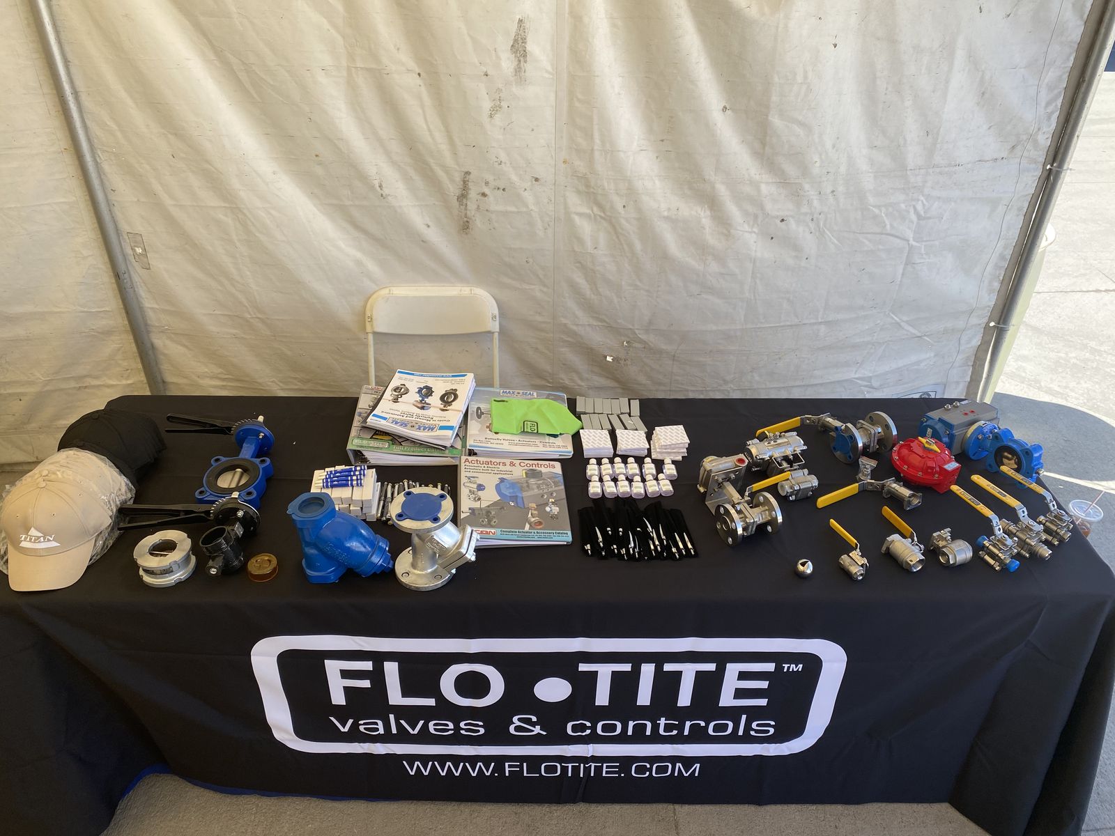 Flo-Tite Valves & Controls tabletop display with ball valves and actuators
